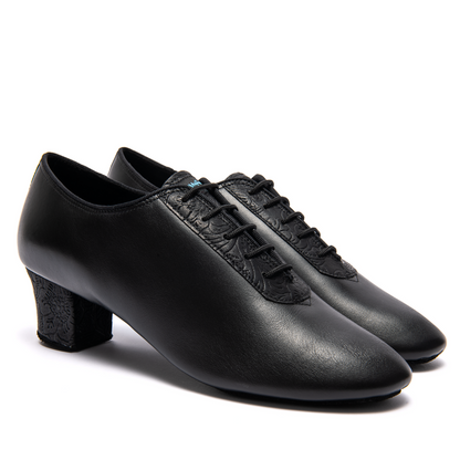 International Dance Shoes IDS Latin Black Men's Dance Shoe in Calf/Fiori, featuring a smooth leather finish with elegant embossed heel.