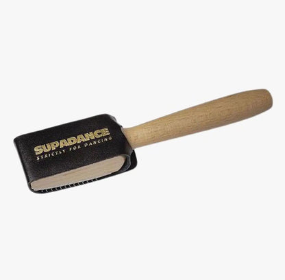 Supadance shoe brush with protective cover, designed to maintain suede soles in top condition. Ideal for dancers and shoe care enthusiasts.