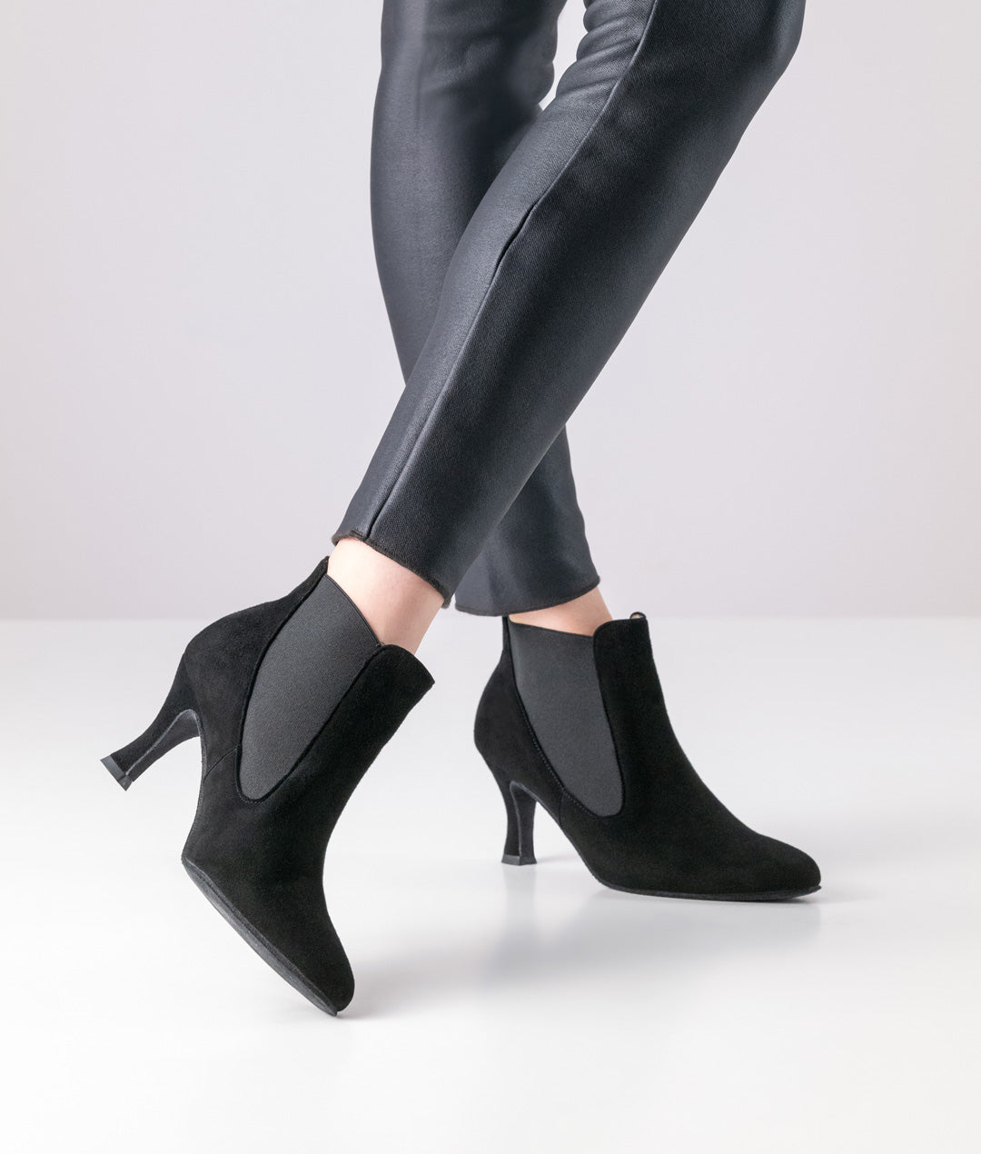 Right Side view of dancer wearing Werner Kern Carina Black Suede Social Dance Ankle Boot with Elasticated Side Inserts