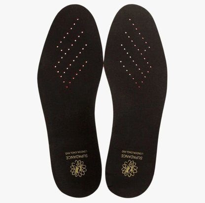 Top view of Supadance unisex cushioned insole with black surface, perforations, and gold branding for superior foot comfort.