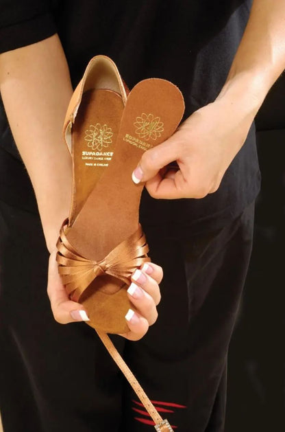 Supadance Slim Fit Converter in Dark Tan color being inserted into an open-toe dance sandal for a secure and comfortable fit.